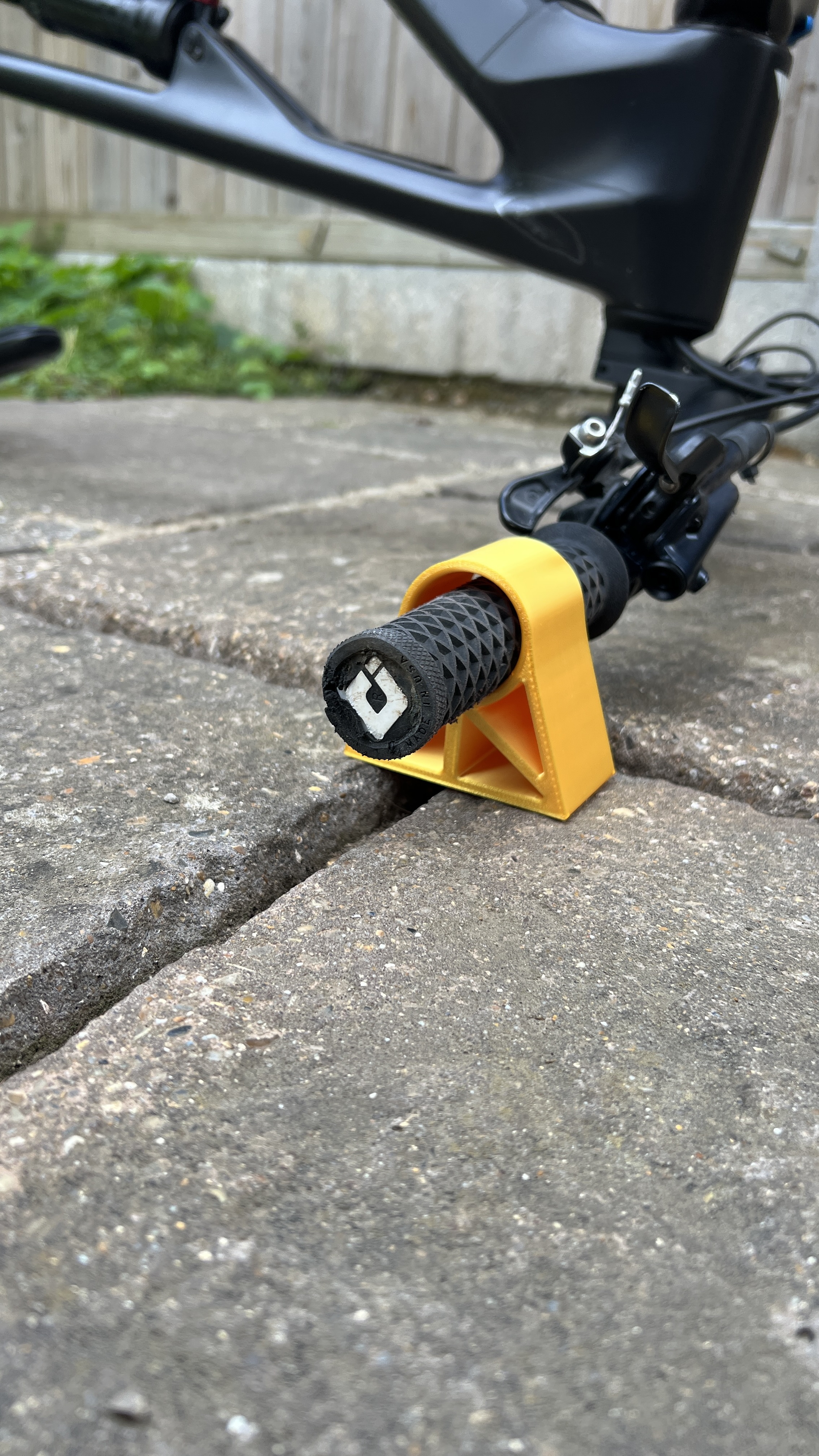 Orange BarGuard close up on an ODI grip